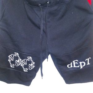 IDKU black shorts with classic Koi fish logo